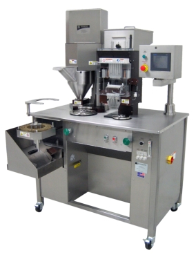 Photo shows a Schaefer Technologies STI 10 capsule filling machine. Schaefer Technologies units, supplied by Glenvale Packaging, are now enhancing throughput speed and production versatility for dietary food supplement and product manufacturer, Metabolics.